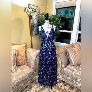 This dress is new without tags and has never been worn. Formal evening gown.